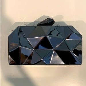 Geometric designer style clutch gun metal